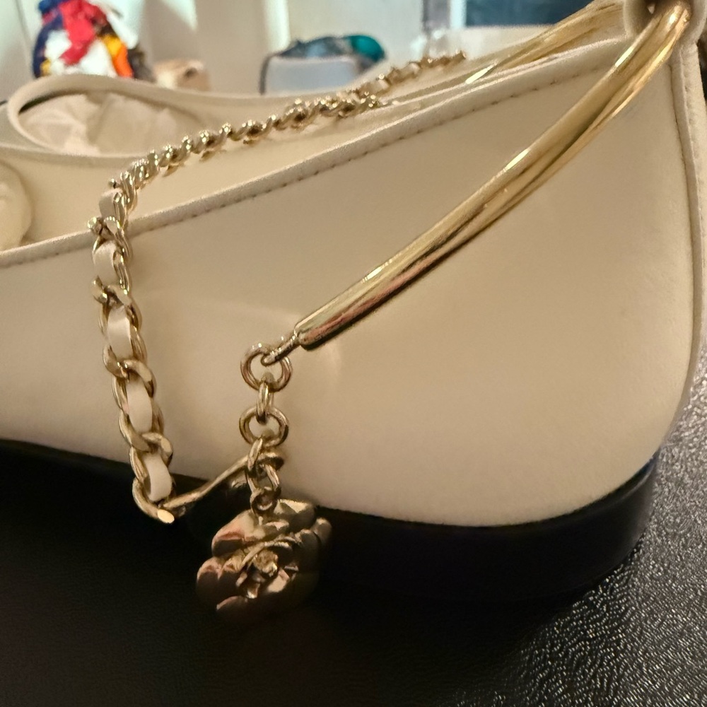 CHANEL Cream Leather Flats with Black Patent Cap-Toe and Gold Chain Strap - Picture 3 of 6